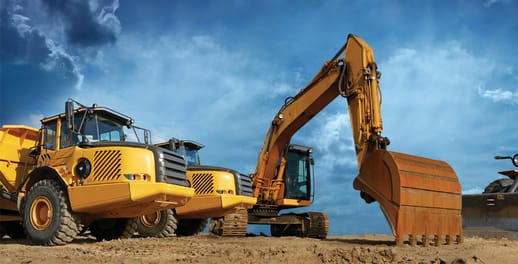 Investec asset finance: two construction vehicles on site